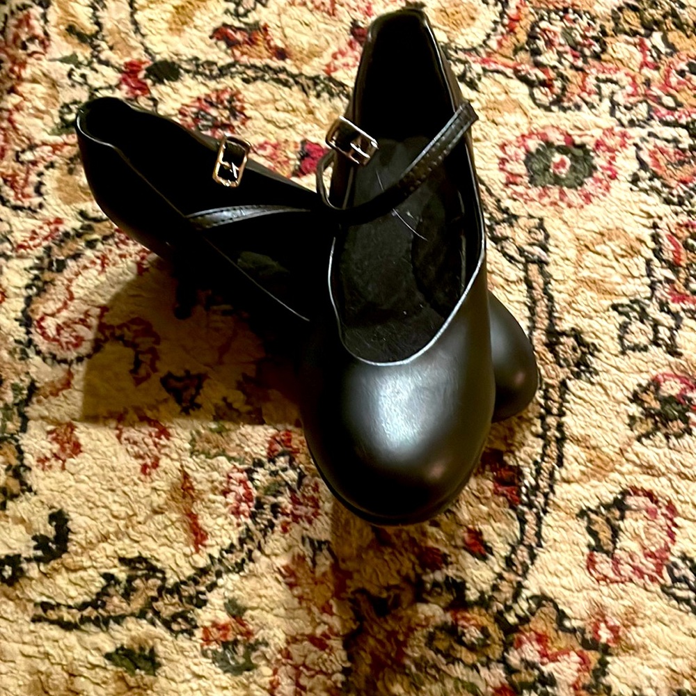 This is a character dance shoe for children.